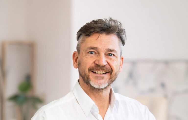 A portrait of a Combi Wear Parts employee